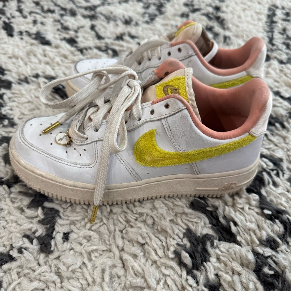 Nike white and yellow AF 1 women’s size 5.
